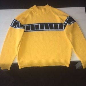 90s yellow and black sweater.